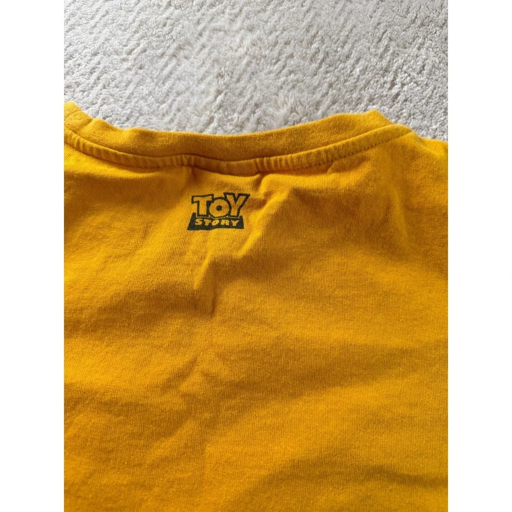 Disney Pixar CacoToy Story T-Shirt Kids S Mustard Yellow Cotton Chest Pocket Tee